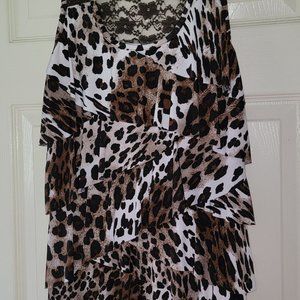 Sleeveless woman's ruffle front top